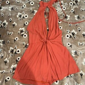 Vibrant Orange Halter Neck Romper with Cinched Waist